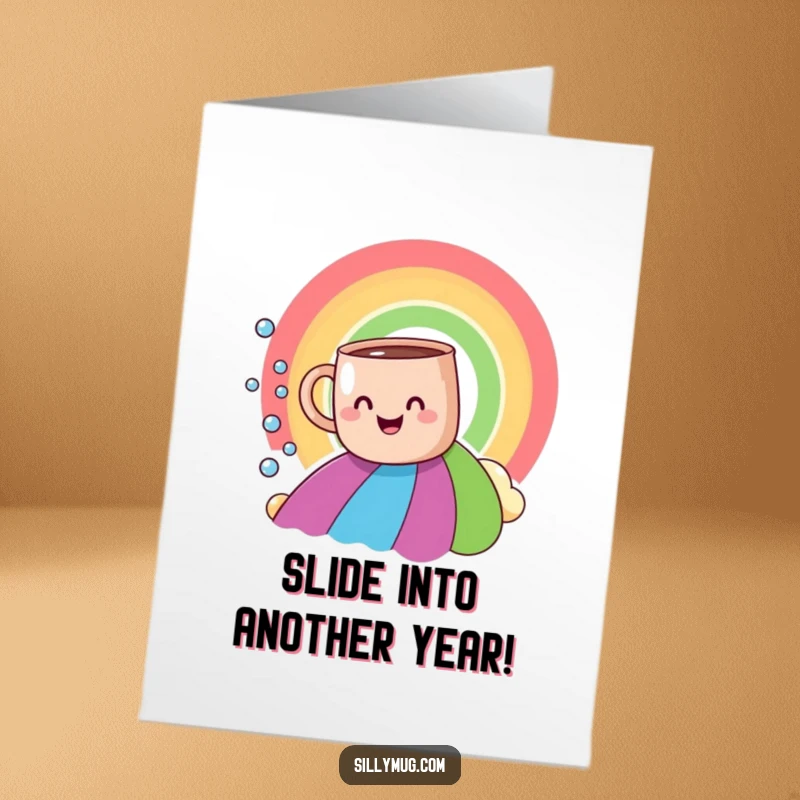 Funny Free Printable Birthday Card: A smiling mug joyfully slides down a vibrant rainbow, leaving a trail of effervescent bubbles.