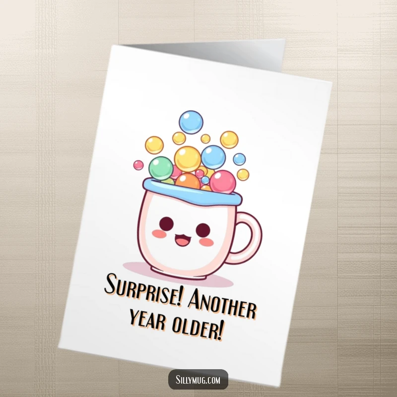 Funny Free Printable Birthday Card: A kawaii mug character surprised by colorful bubbles erupting from within, wishing happy birthday.