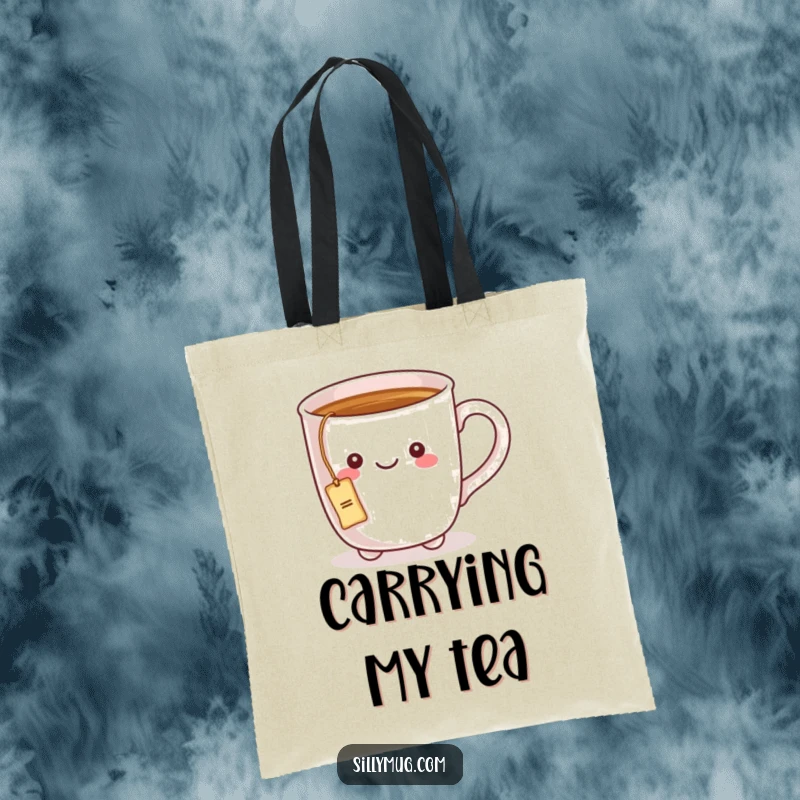 Funny tote bag with a kawaii mug character having a tea bag string tied to its handle, ideal for shopping and tea lovers.